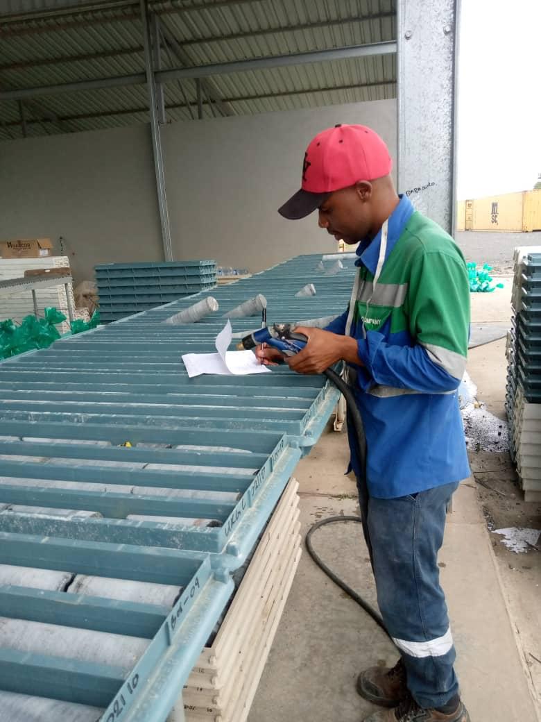 Geologist using Discoverer Recycled Plastic Core Trays