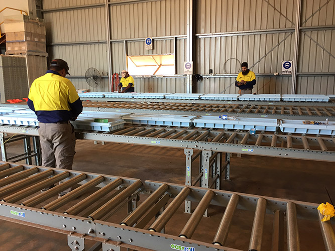 Core shed with roller racking